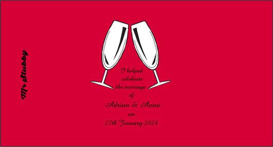 Stubby Holder with two white champagne glasses and text on a red background