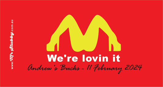 Red background with yellow logo and text 'We're lovin it' on a red background